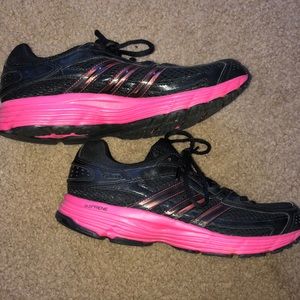 Black and pink Adidas running shoes